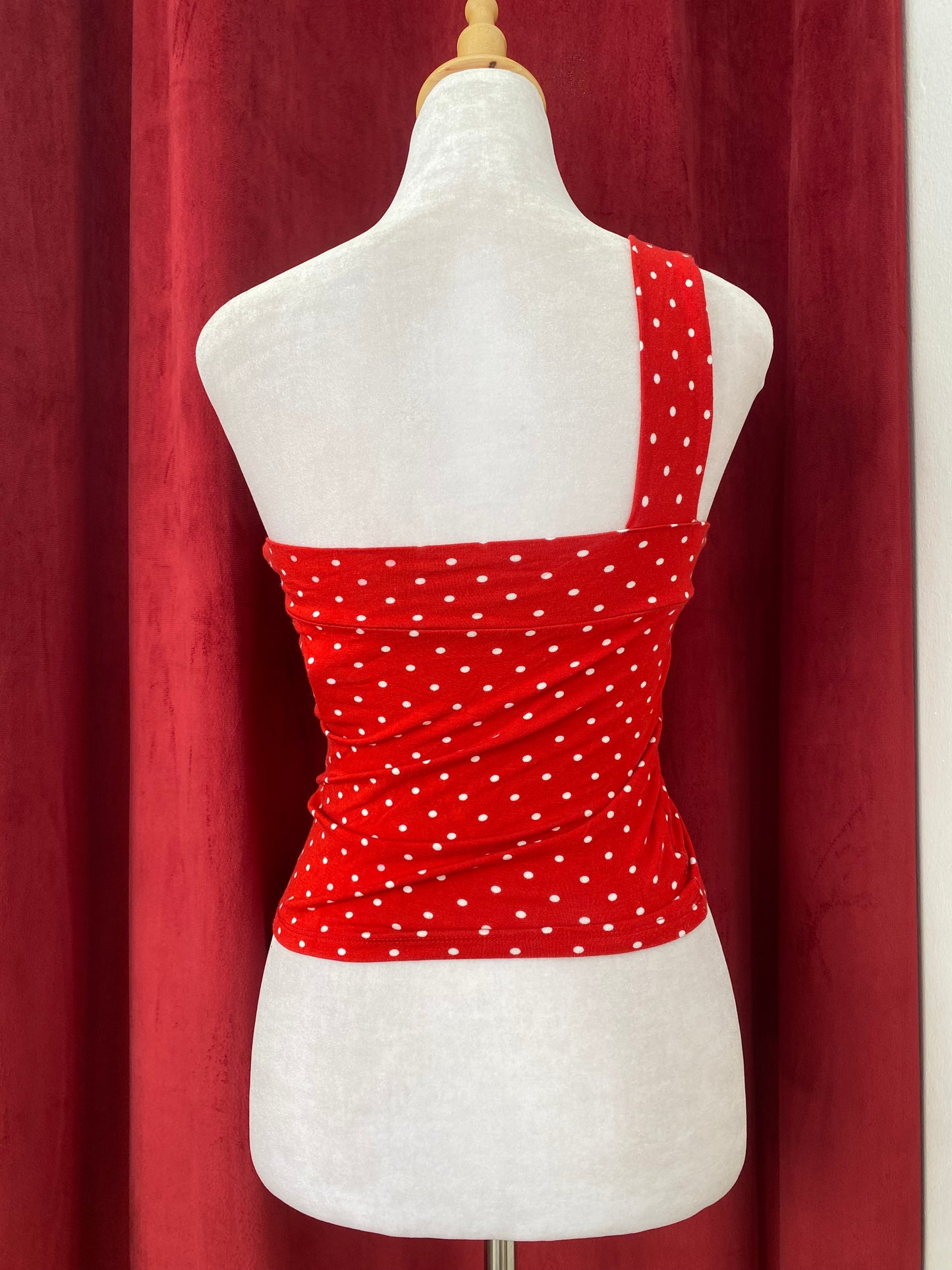 Red one shoulder polka dot top