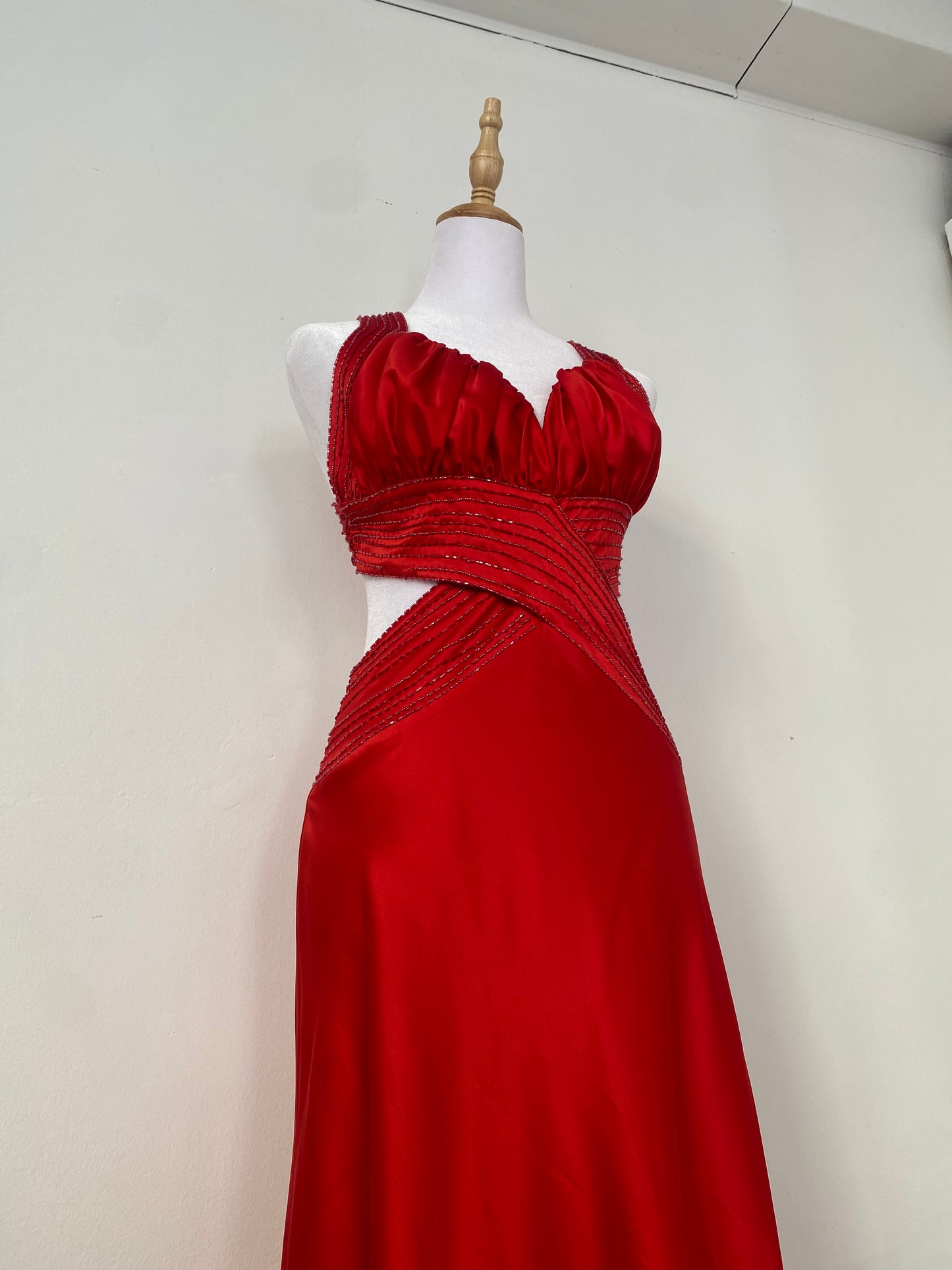 Brand new red satin gown with open back and sequin details
