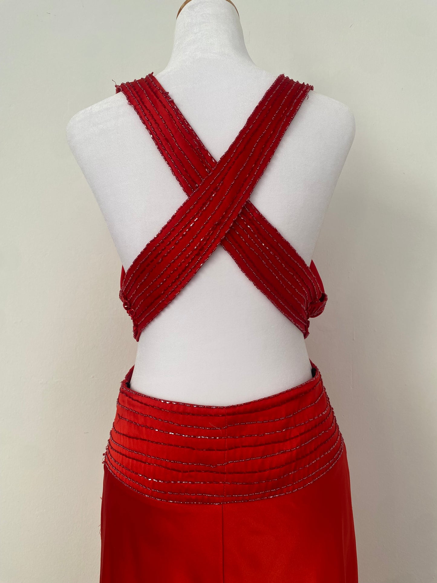Brand new red satin gown with open back and sequin details