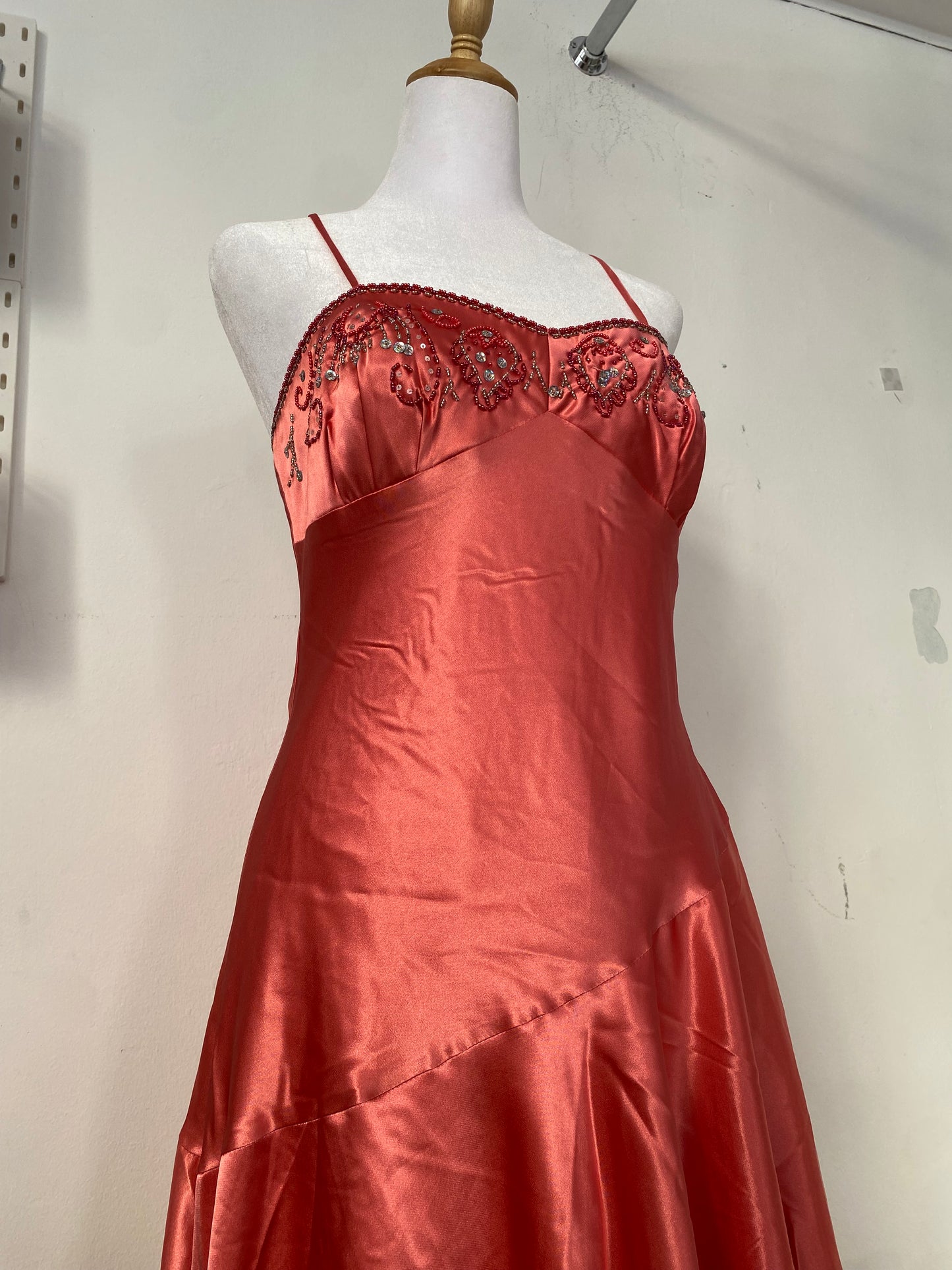 Brand new satin dress with sequin details