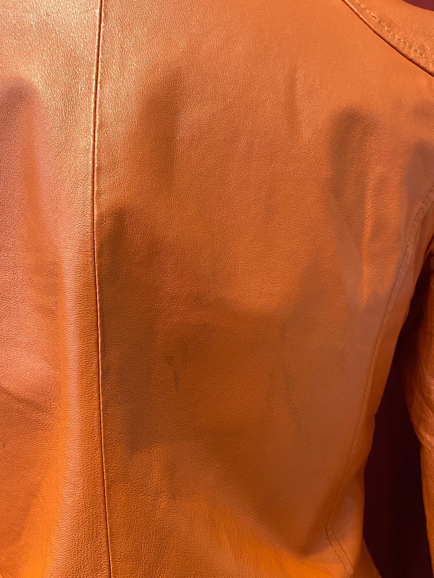 Real leather fitted orange biker jacket
