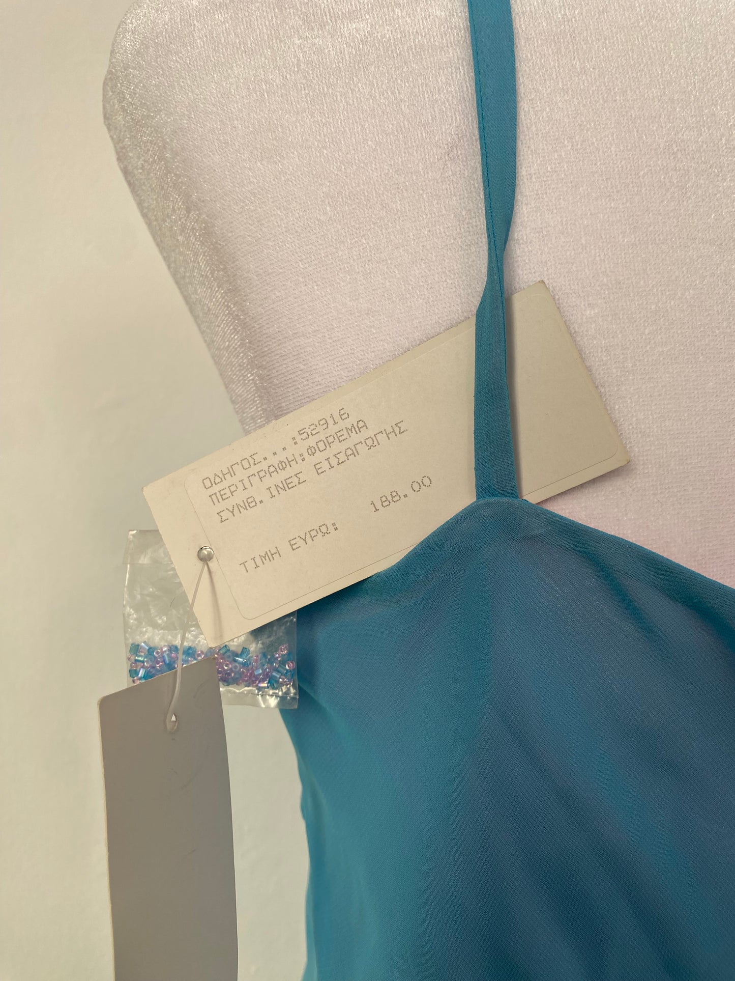 100% silk brand new baby blue dress with sequin details