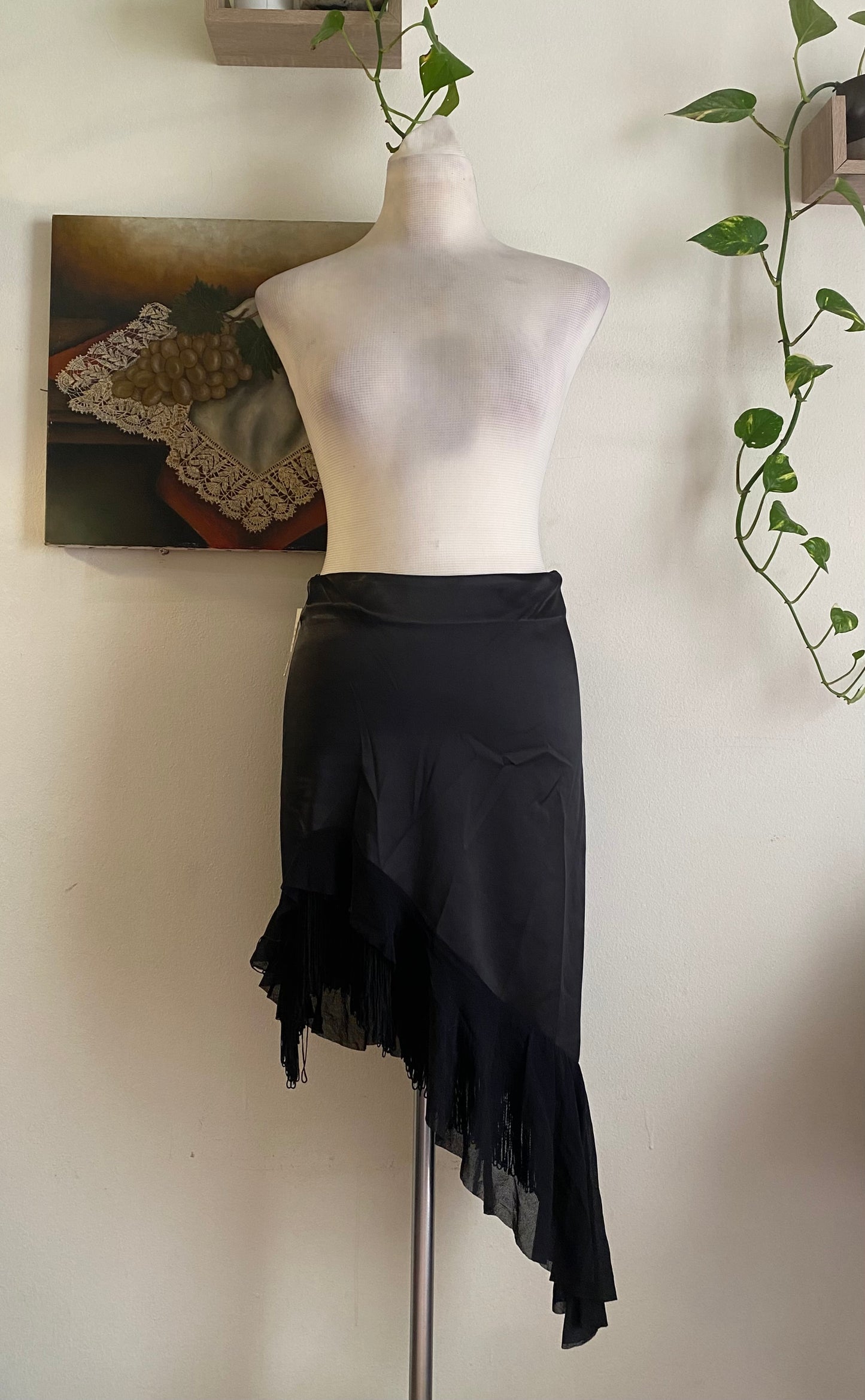 Brand new black asymmetrical satin skirt with fringe details