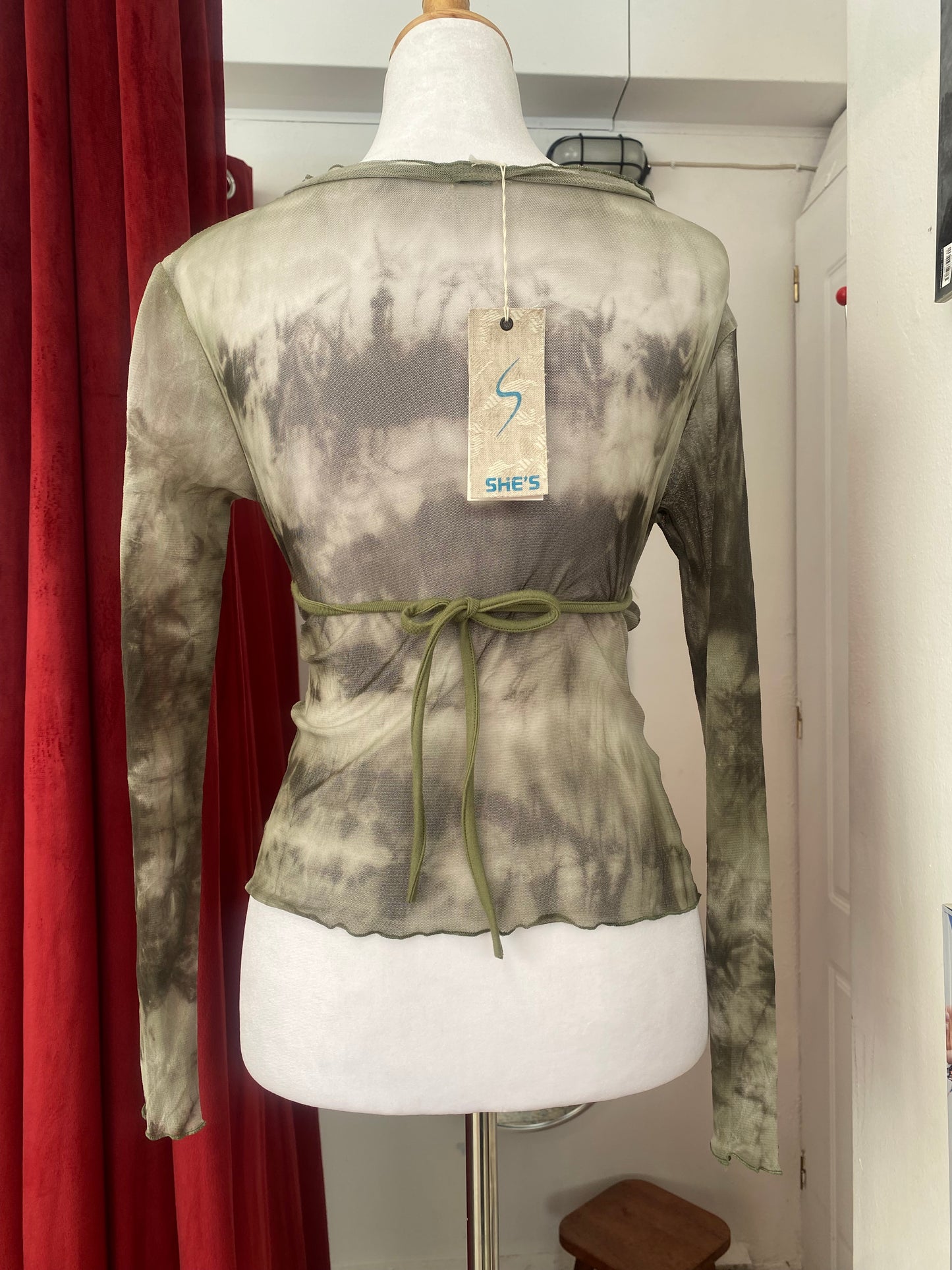 Brand new green top with sheer back