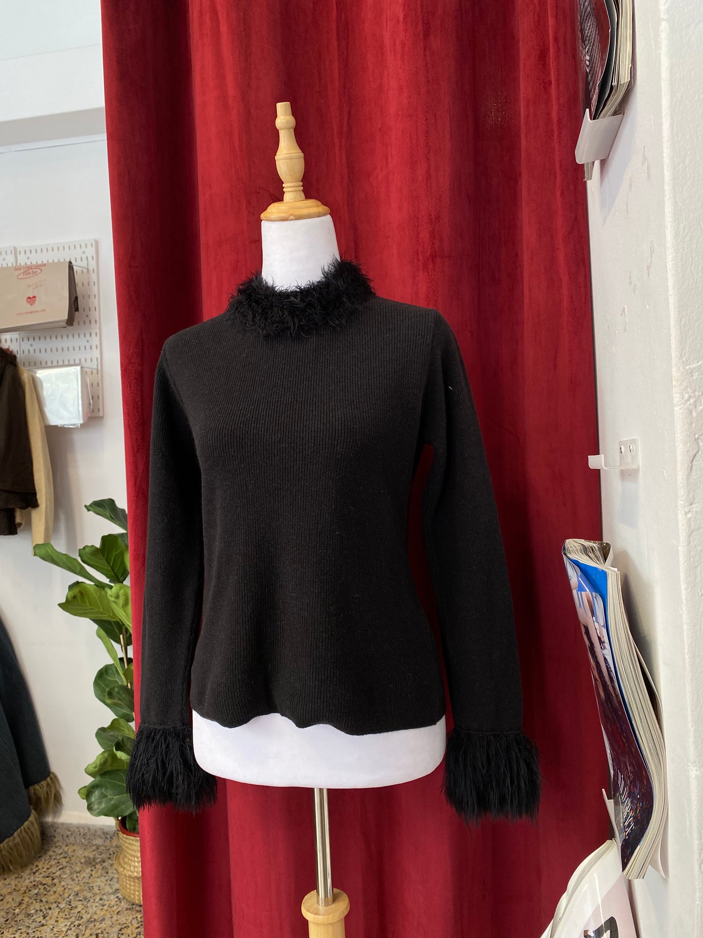 Black knitted top with fur details on collar and sleeves