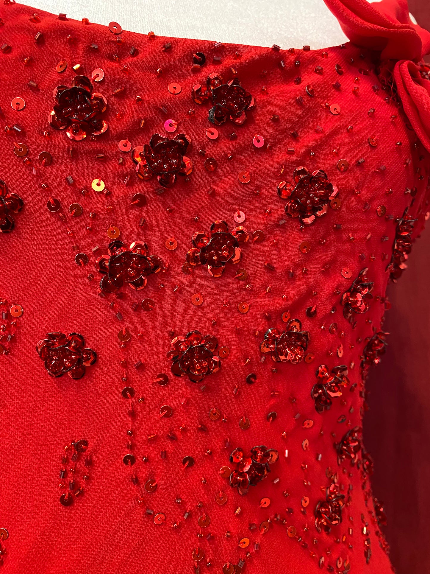 Brand new maxi dress with sequin and flower details