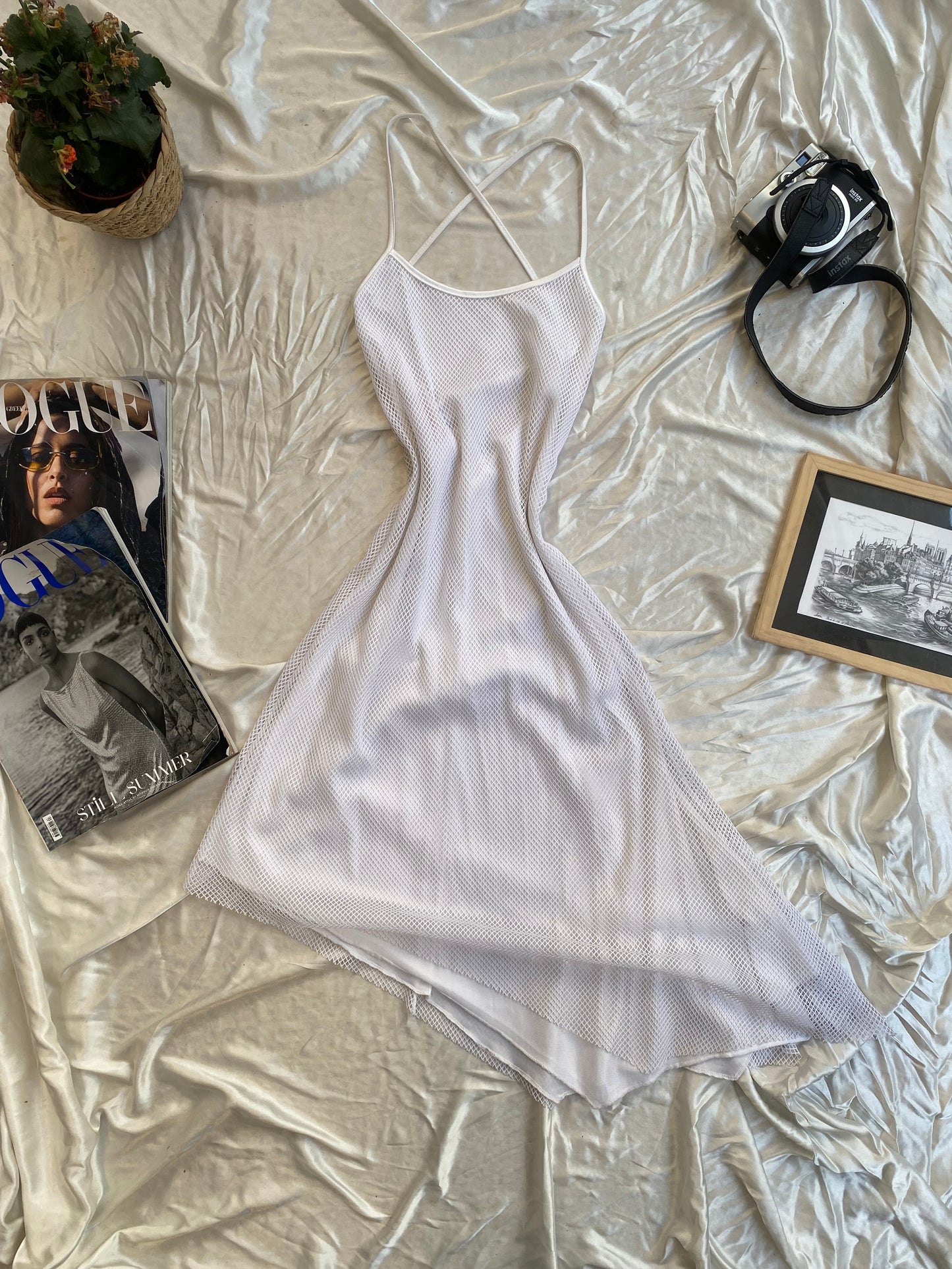 White fishnet open back dress