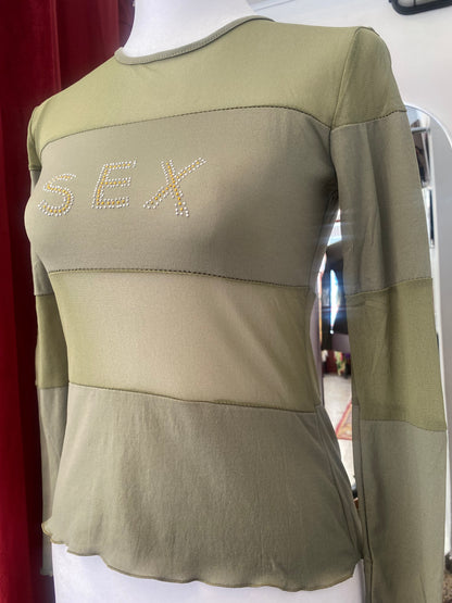 Brand new sheer top with sequin”sex” logo