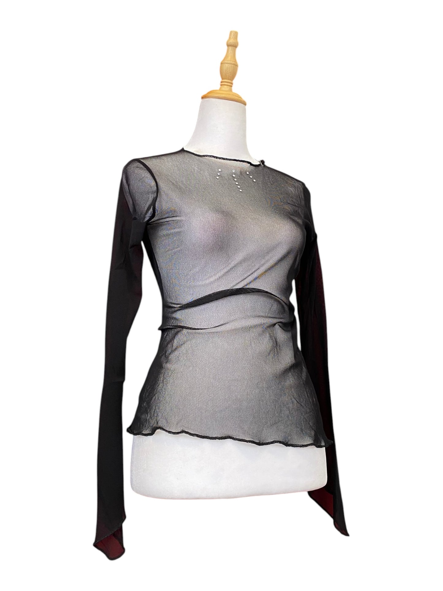 Sheer black top with rhinestone details