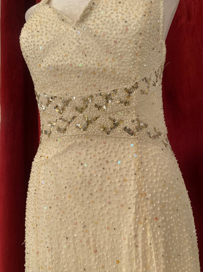 100% silk floor length gown with all over handbeaded details