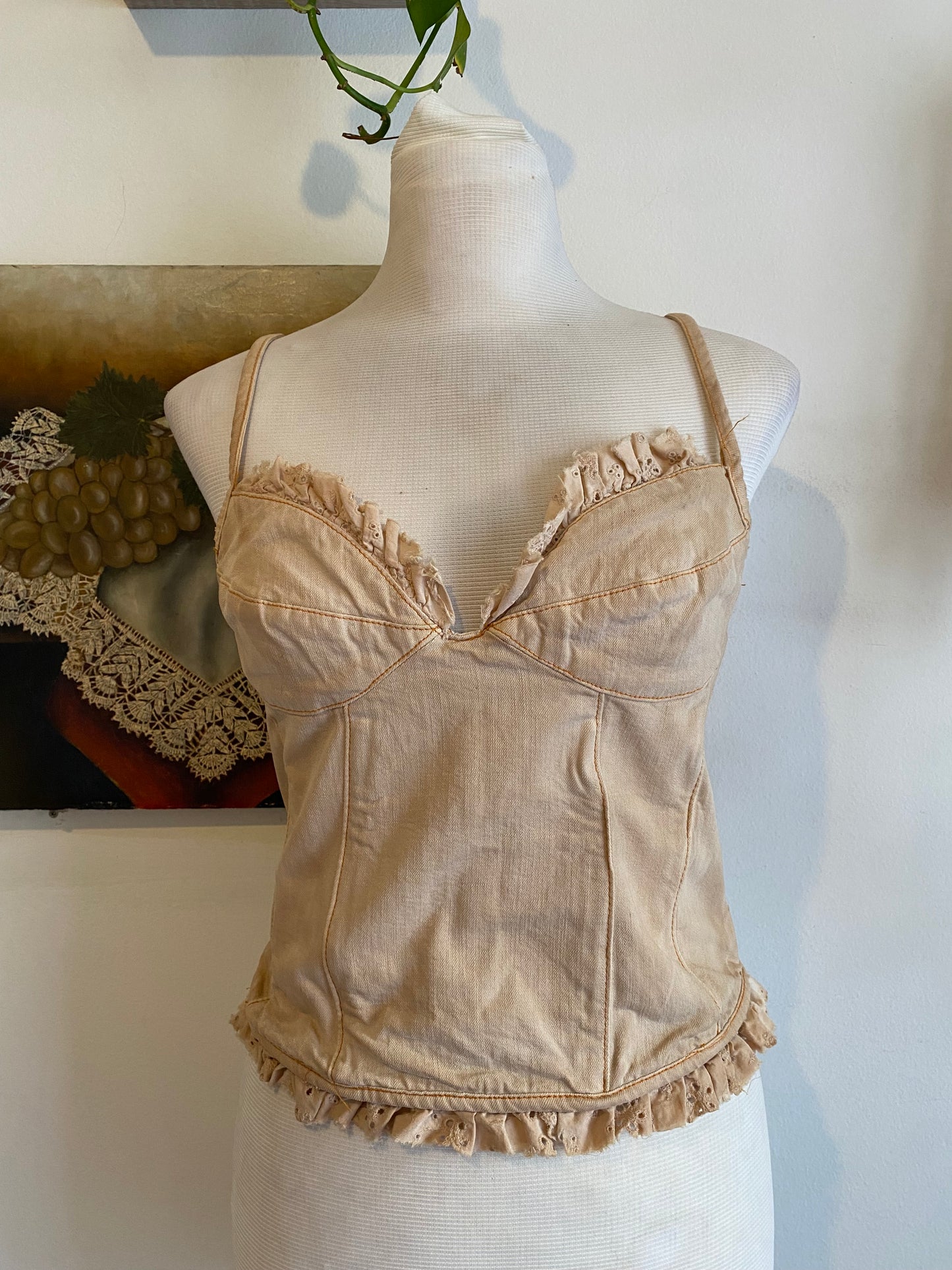 Denim corset with washed out details