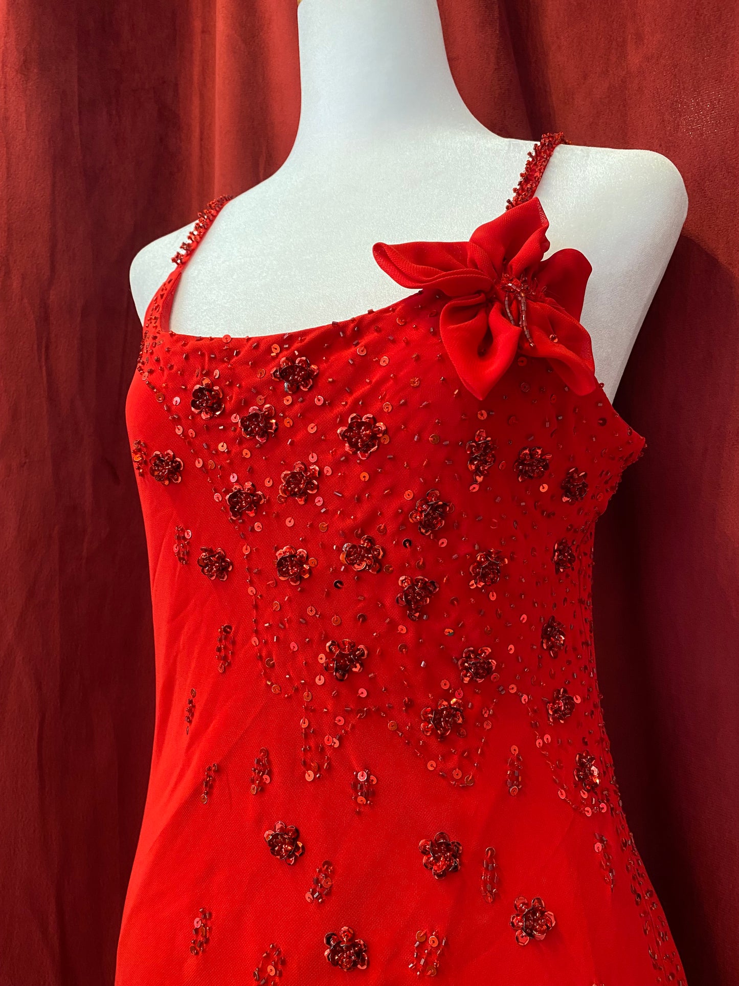 Brand new maxi dress with sequin and flower details