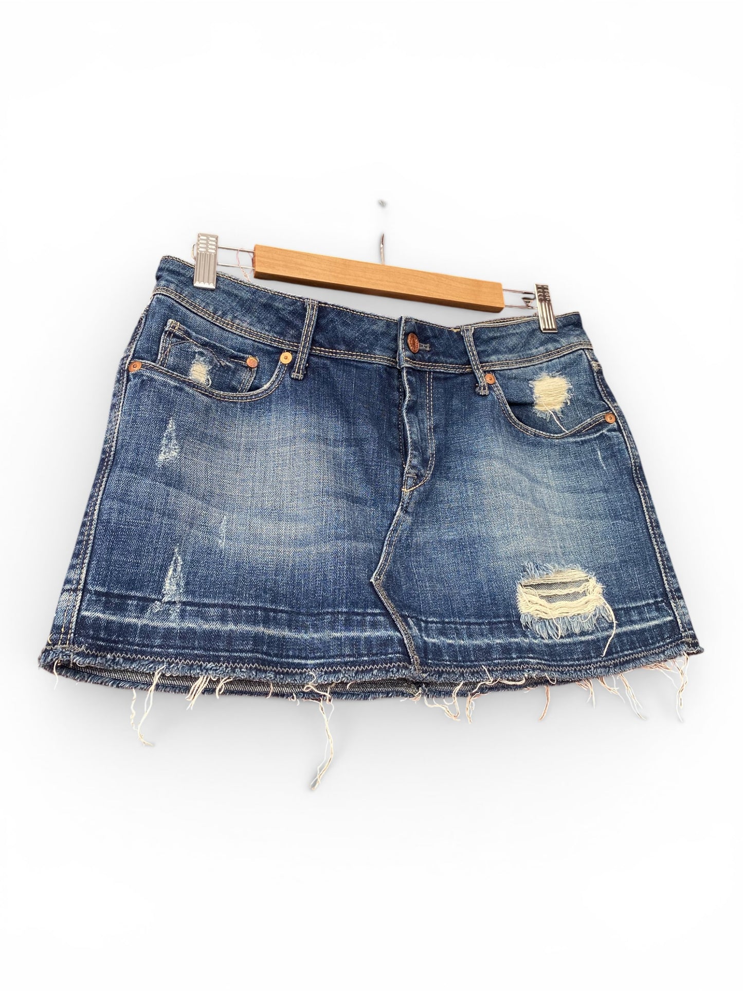 Distressed mini denim skirt