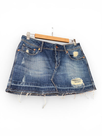 Distressed mini denim skirt