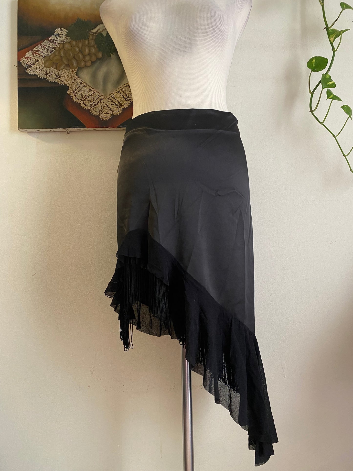 Brand new black asymmetrical satin skirt with fringe details