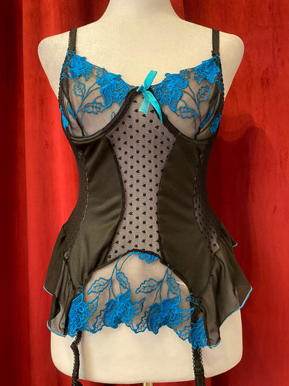 Black corset with blue hints and lace up details in the back