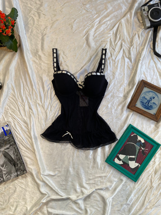 Black corset with white lace details