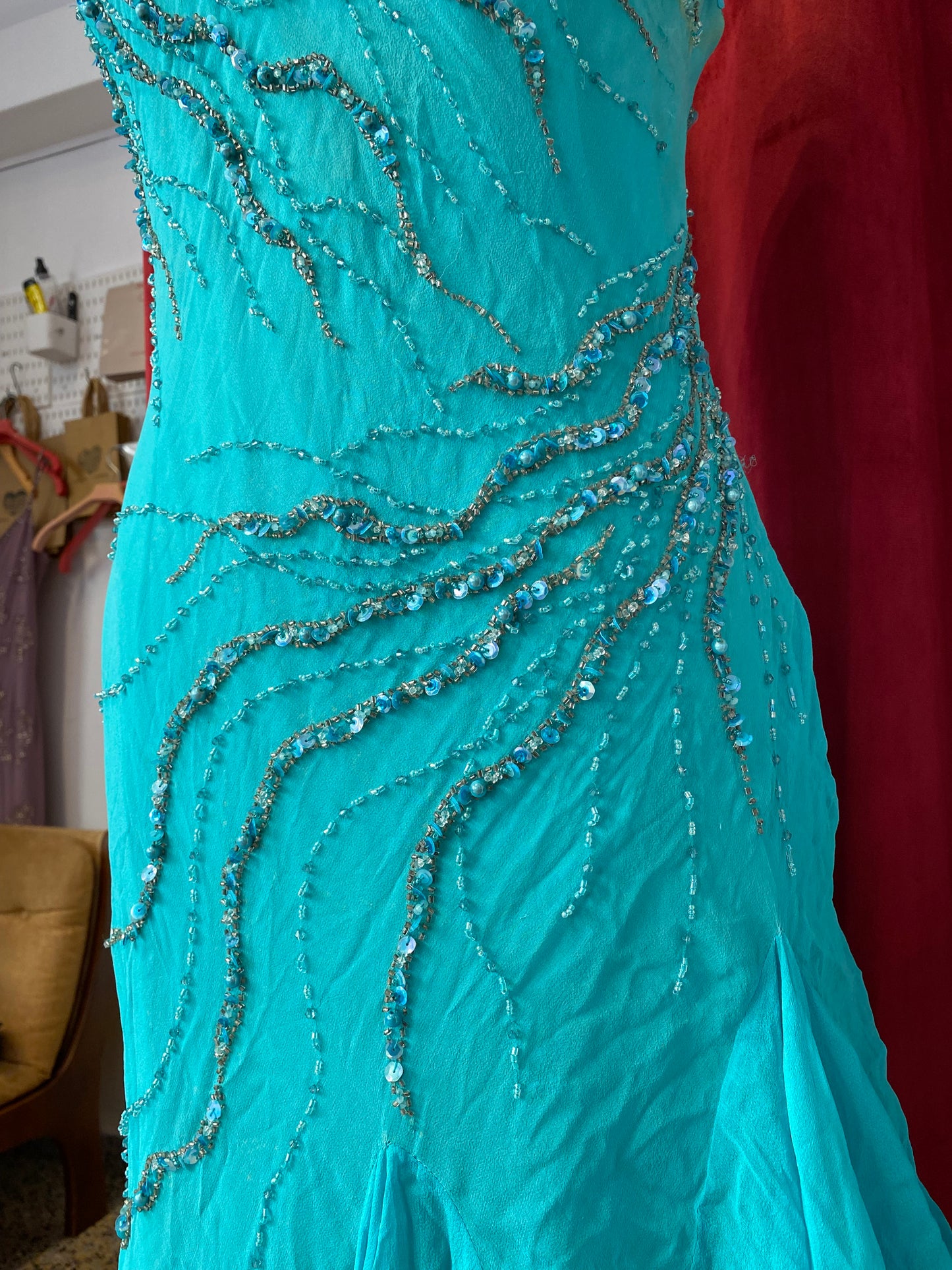 100% silk handbeaded gown with ruffles details