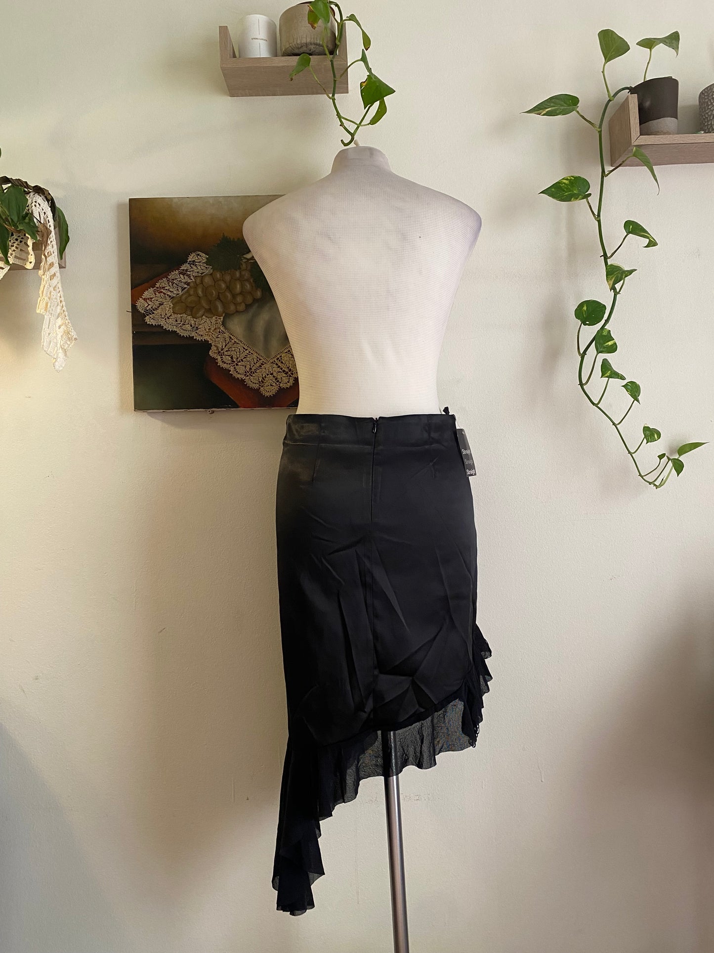 Brand new black asymmetrical satin skirt with fringe details