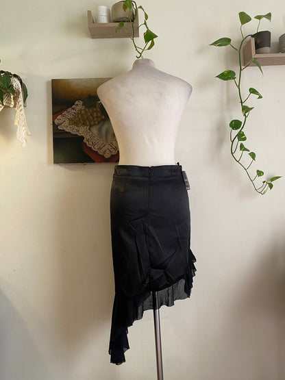 Brand new black asymmetrical satin skirt with fringe details