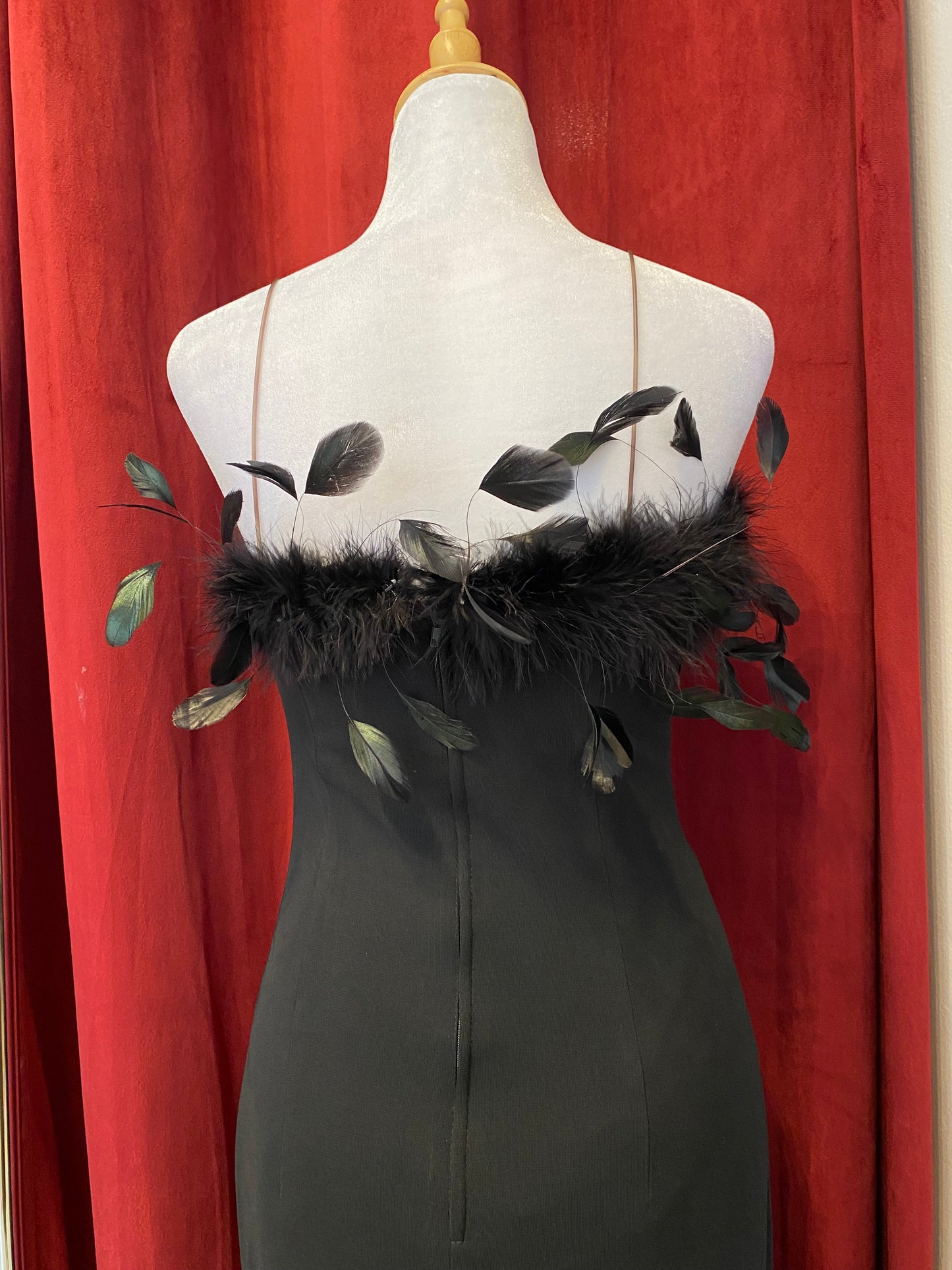 Brand new black gown with feather details