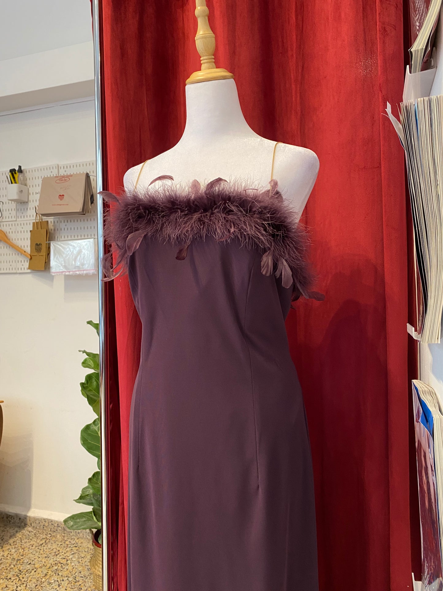Brand new deep purple gown with feather bust