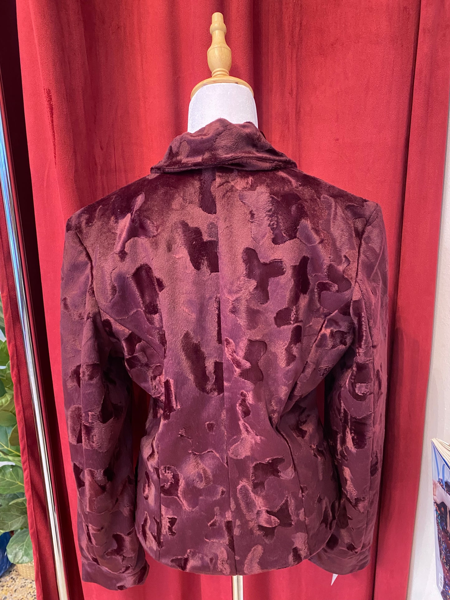 Deep burgundy faux fur jacket with cow print details