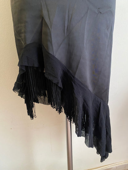 Brand new black asymmetrical satin skirt with fringe details