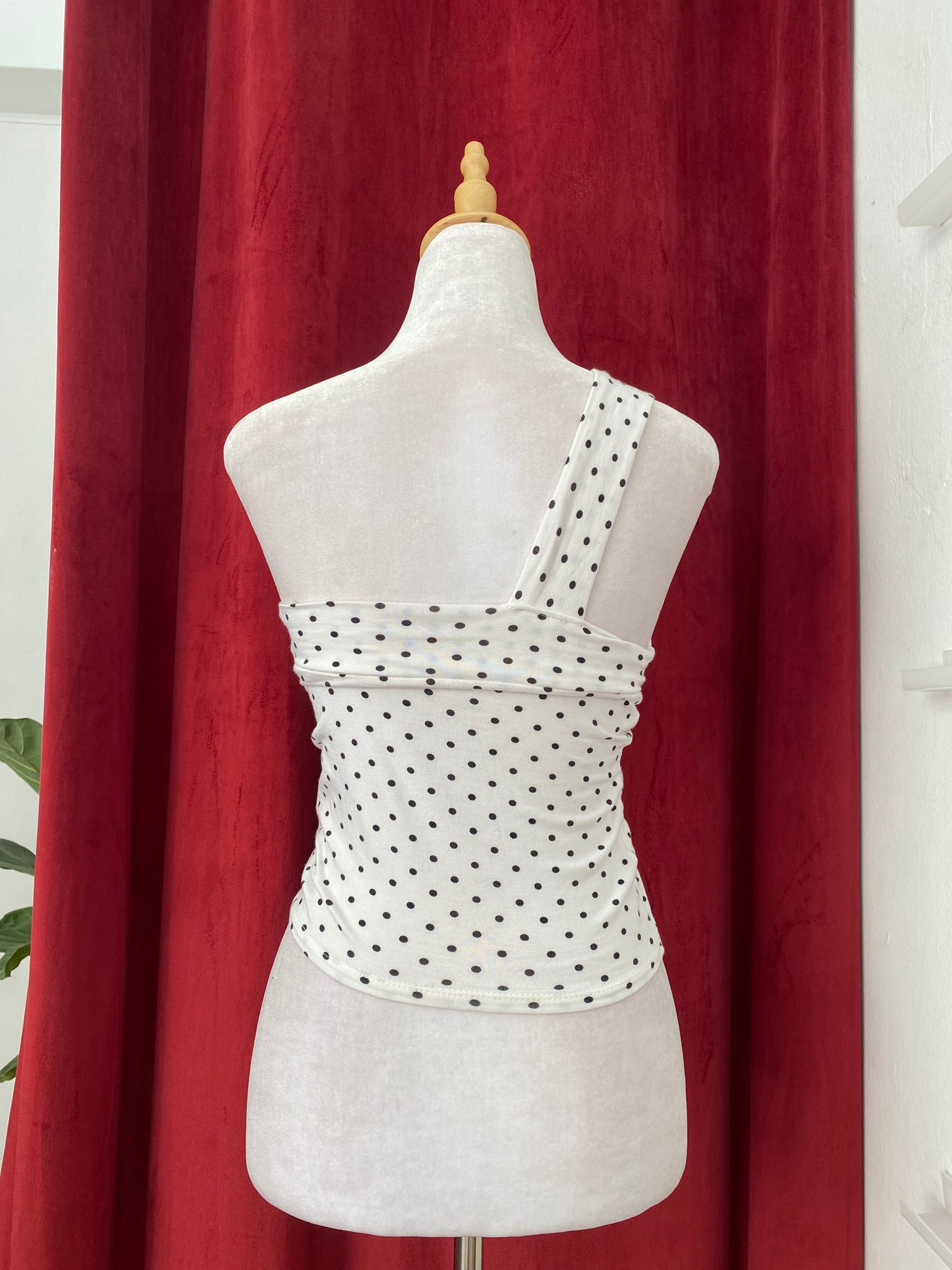White one shoulder polka dot top