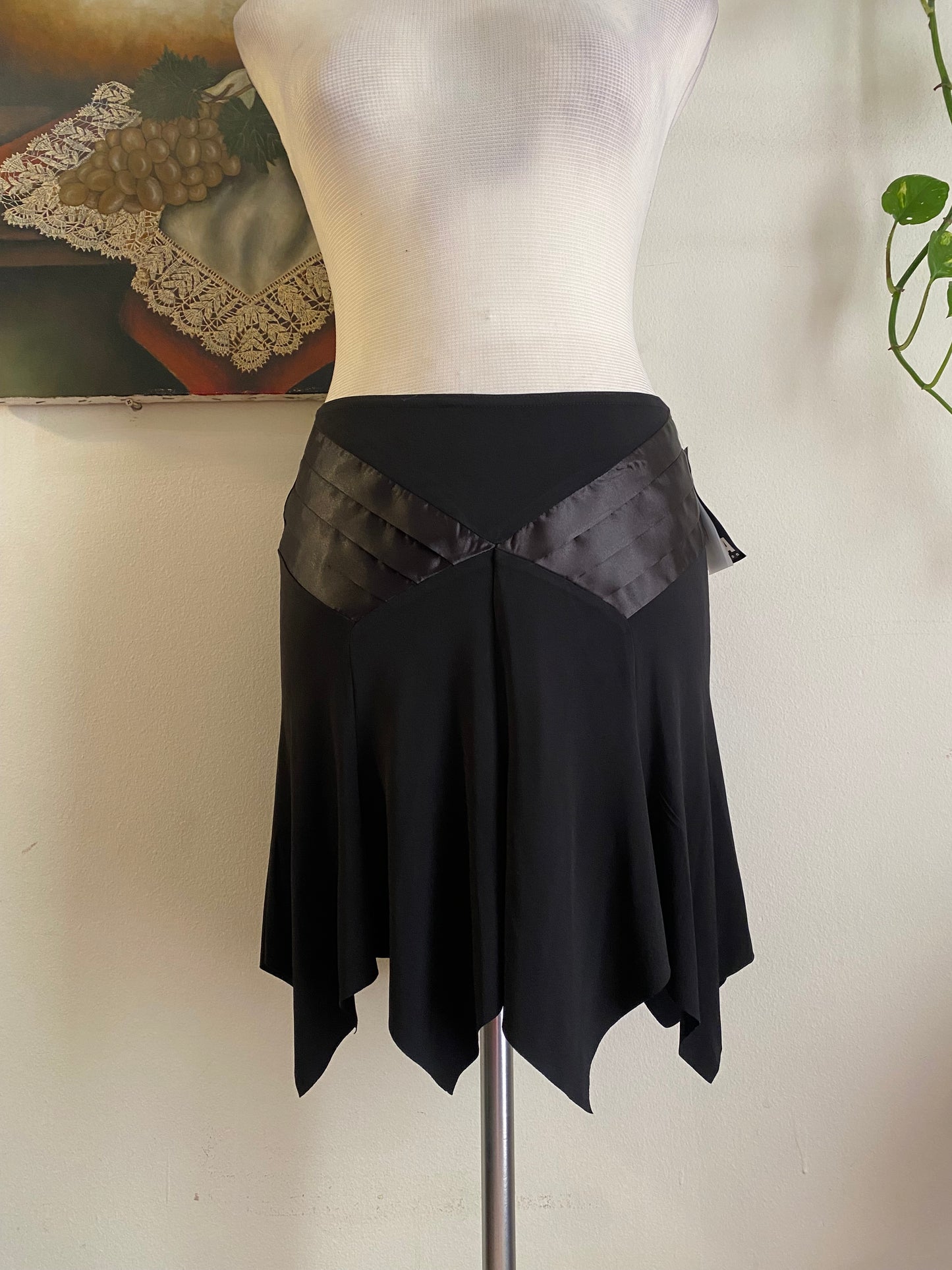 Brand new black asymmetrical mini skirt