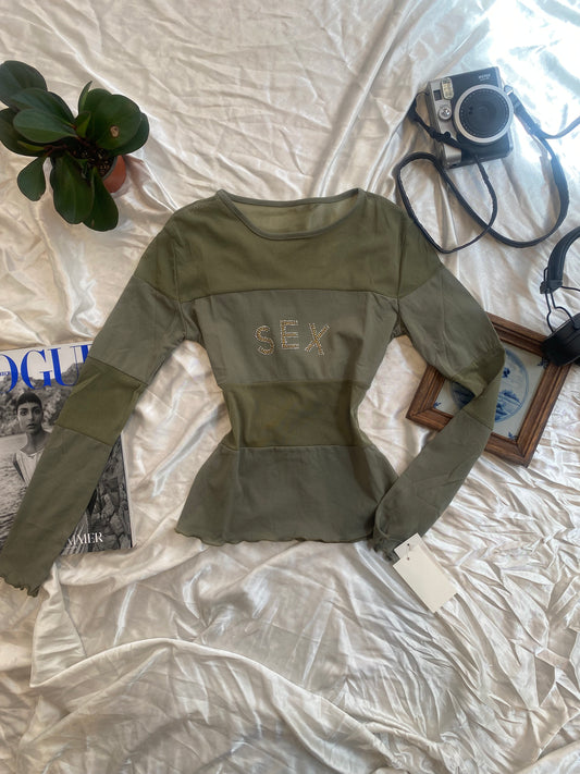 Brand new sheer top with sequin”sex” logo