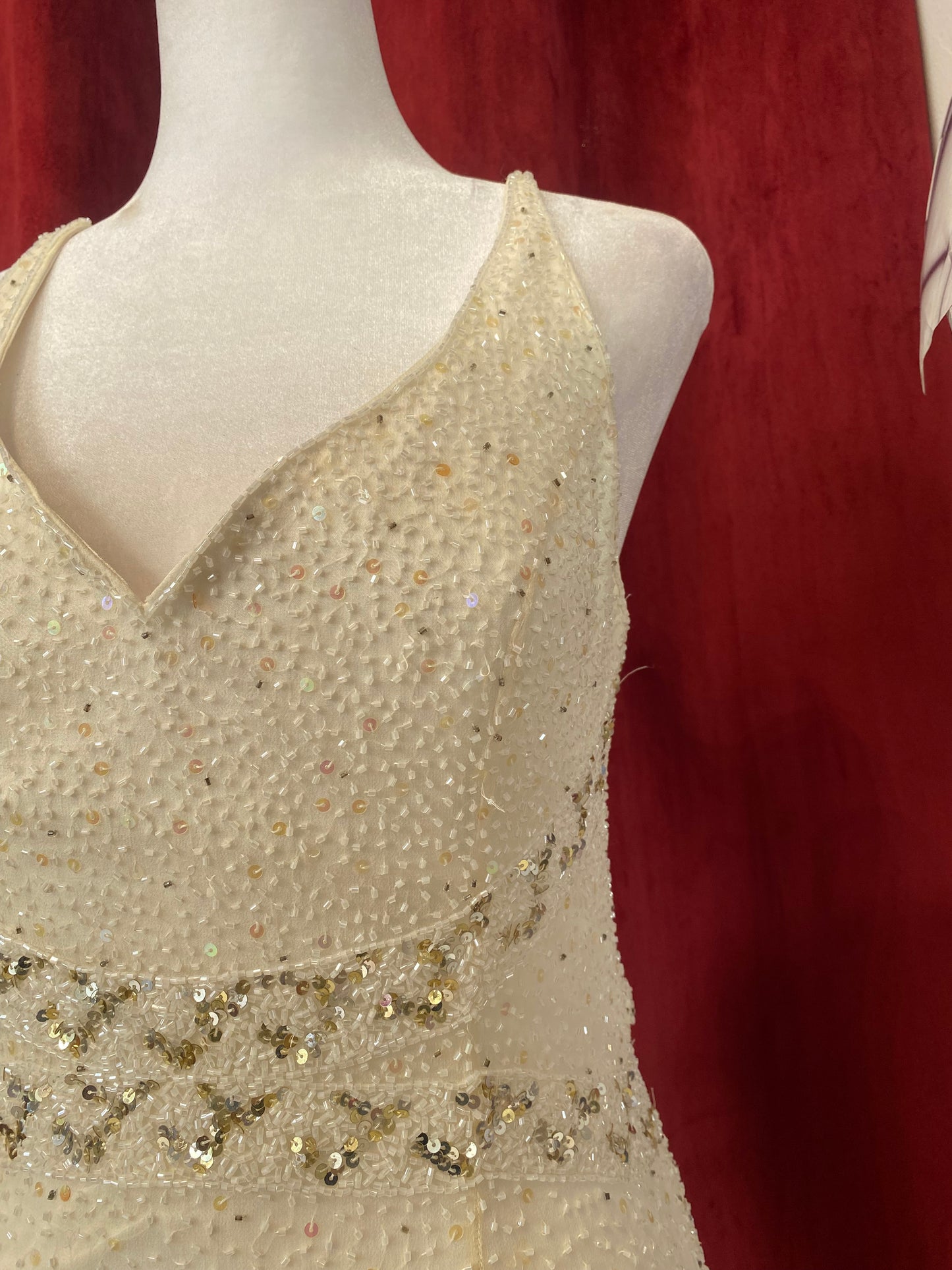 100% silk floor length gown with all over handbeaded details