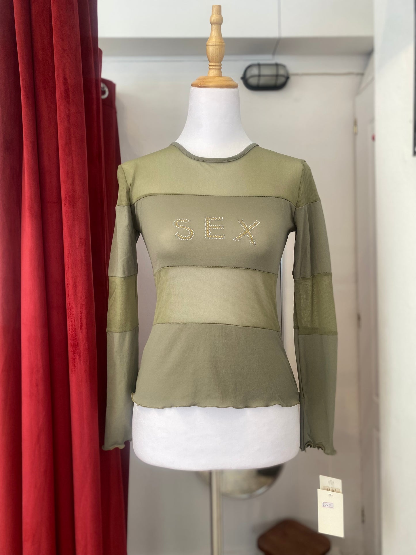 Brand new sheer top with sequin”sex” logo