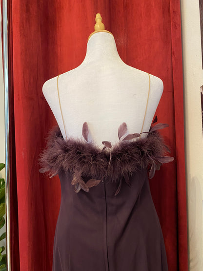Brand new deep purple gown with feather bust