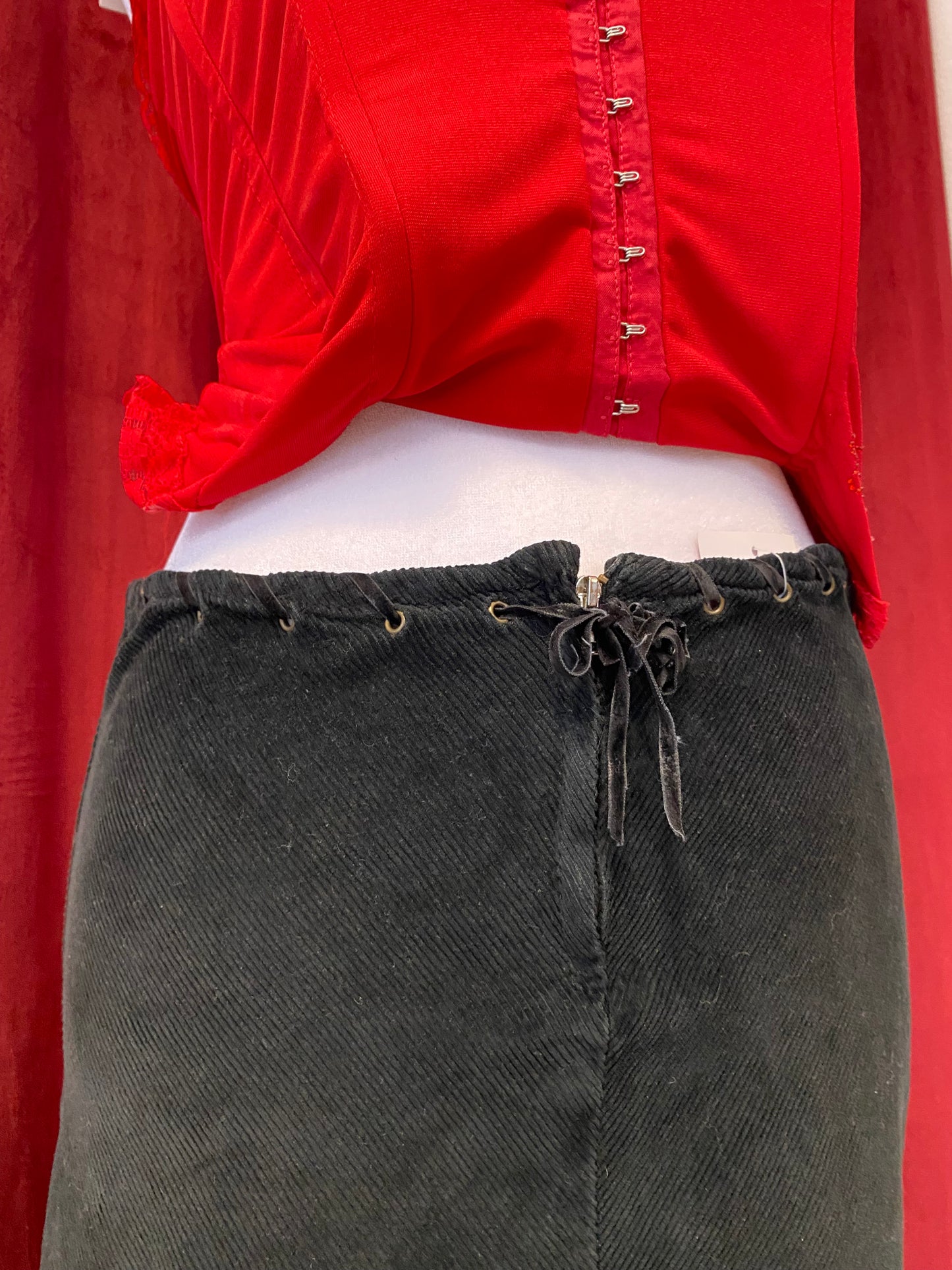 Corduroy midi skirt with leather belt details