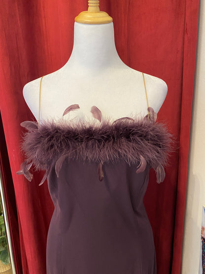 Brand new deep purple gown with feather bust