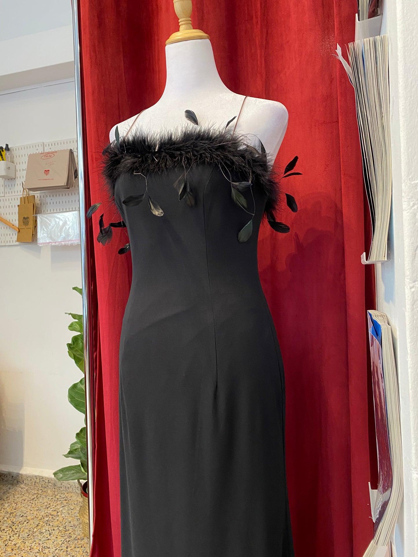 Brand new black gown with feather details