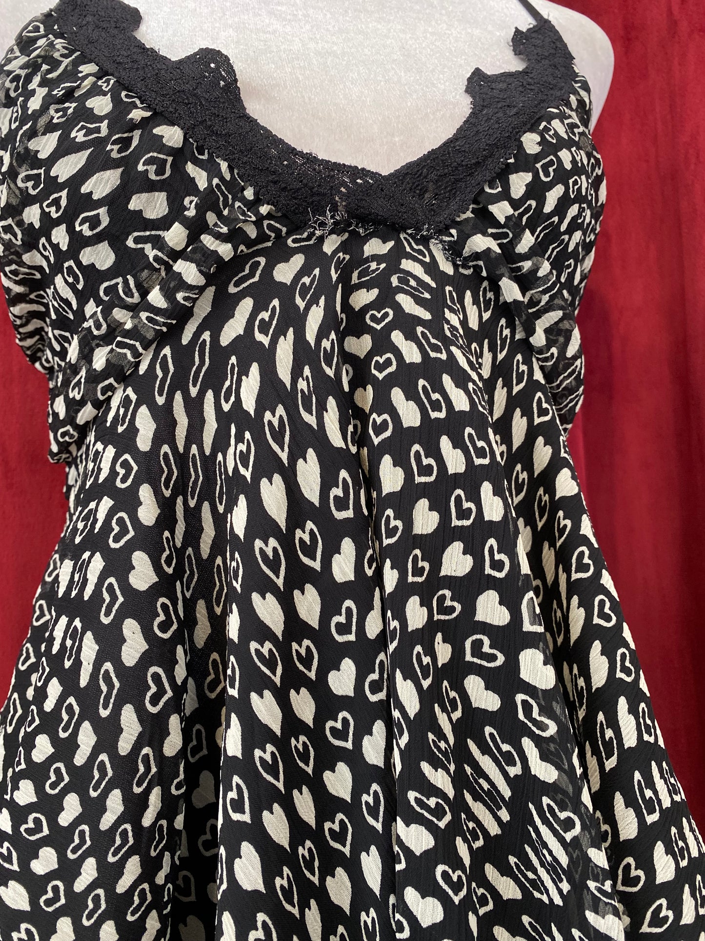 Summer asymmetrical top with heart design 🤍