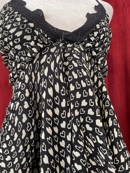 Summer asymmetrical top with heart design 🤍