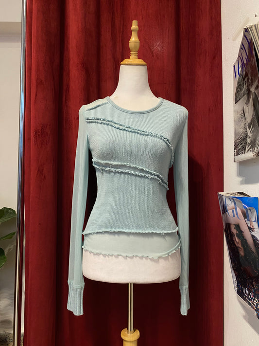 Baby blue knitted top with see through details