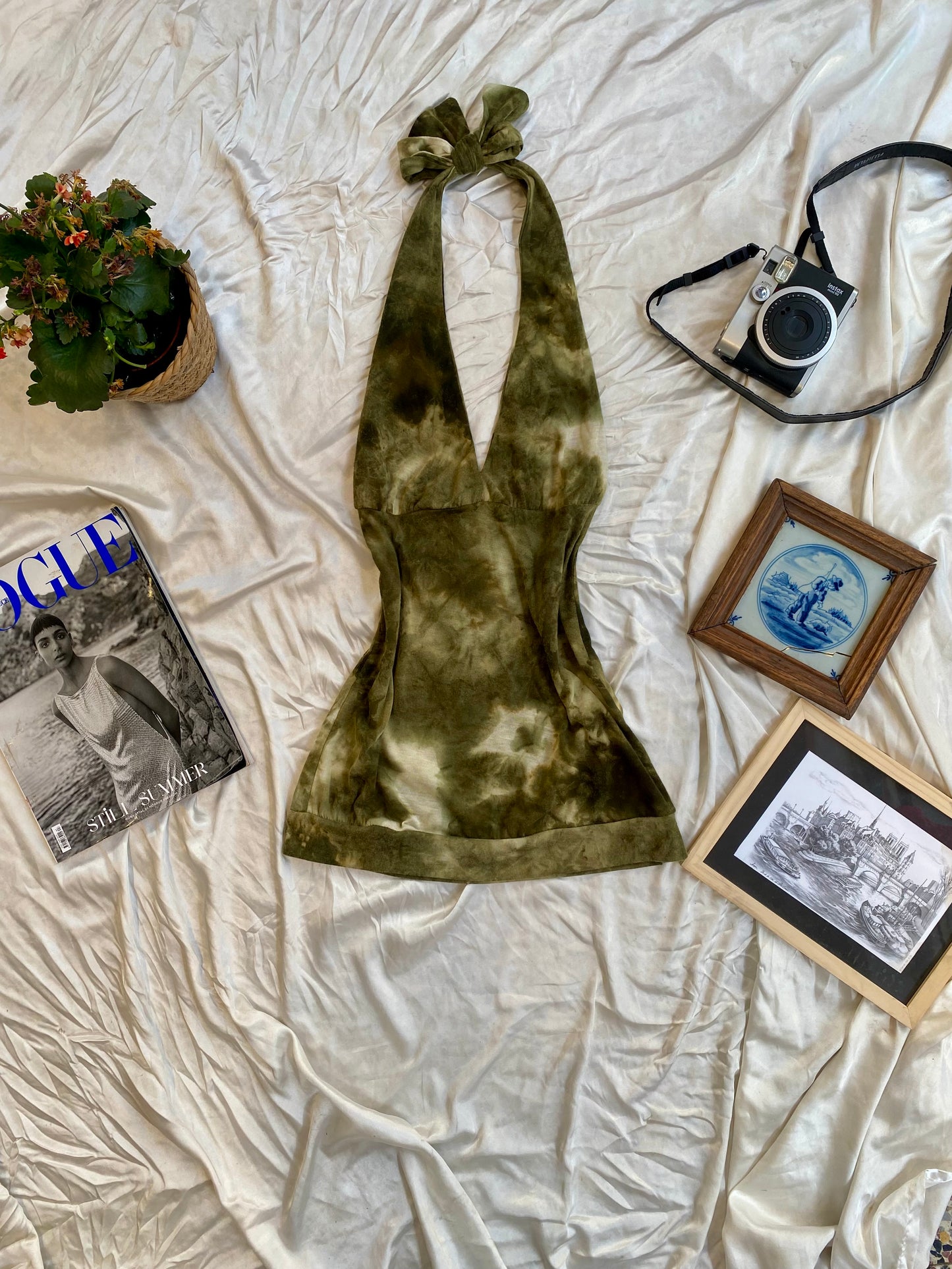 Fairy open back green top