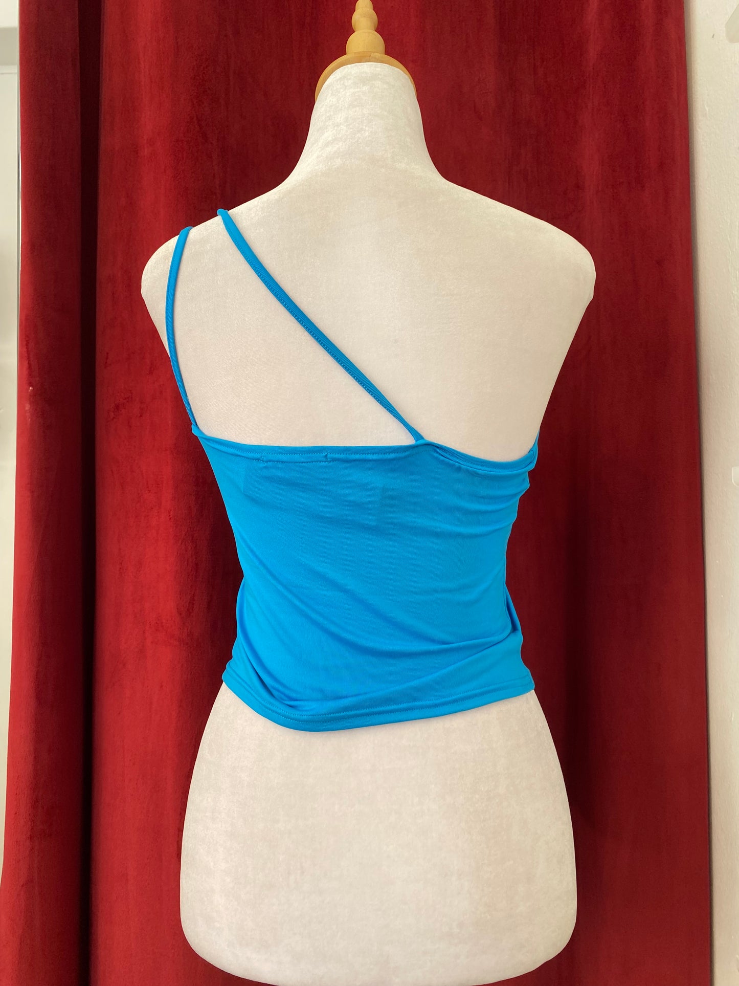 One shoulder blue top