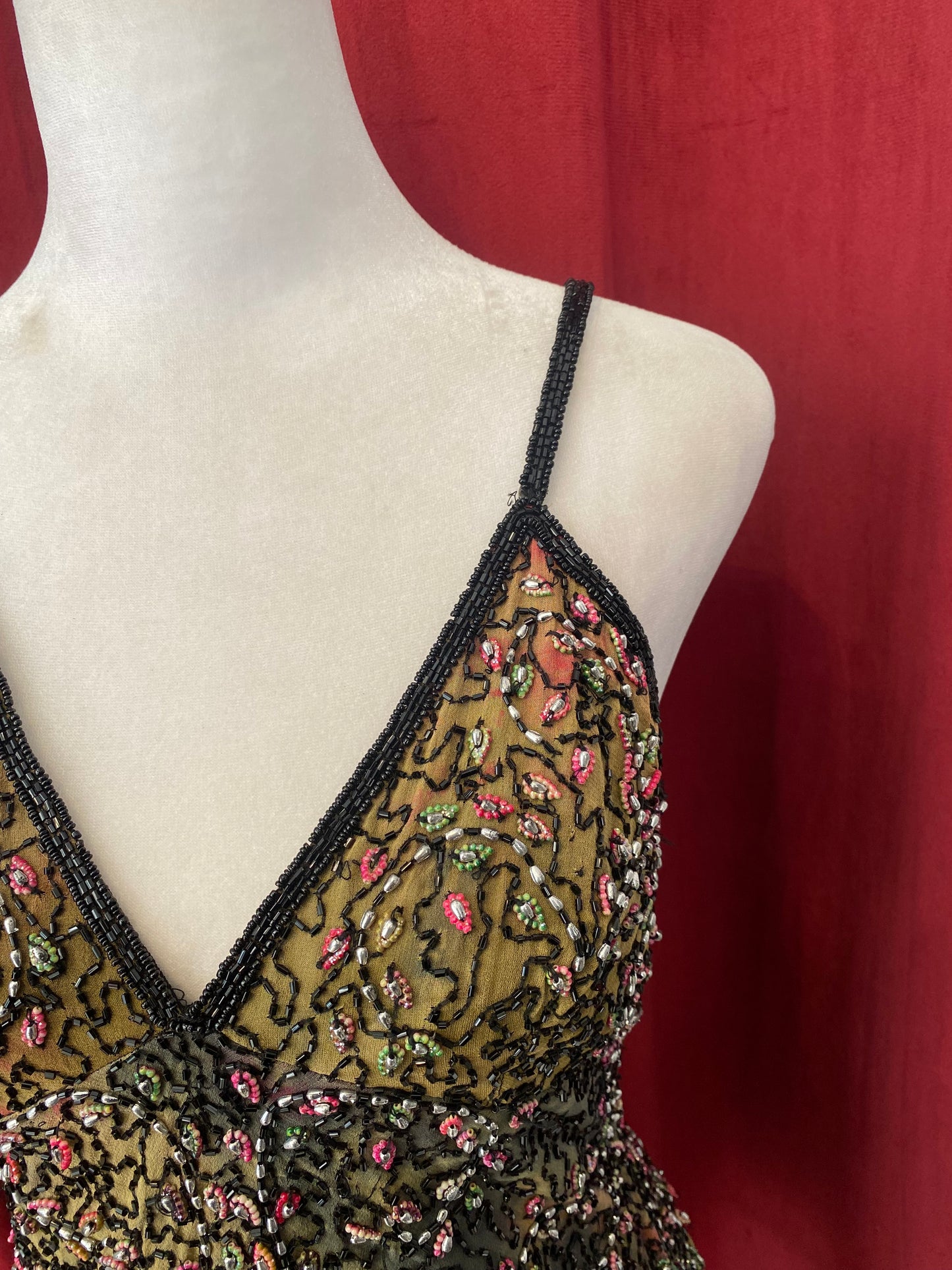 100% silk handbeaded top 🦚