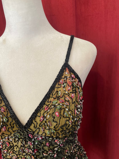 100% silk handbeaded top 🦚