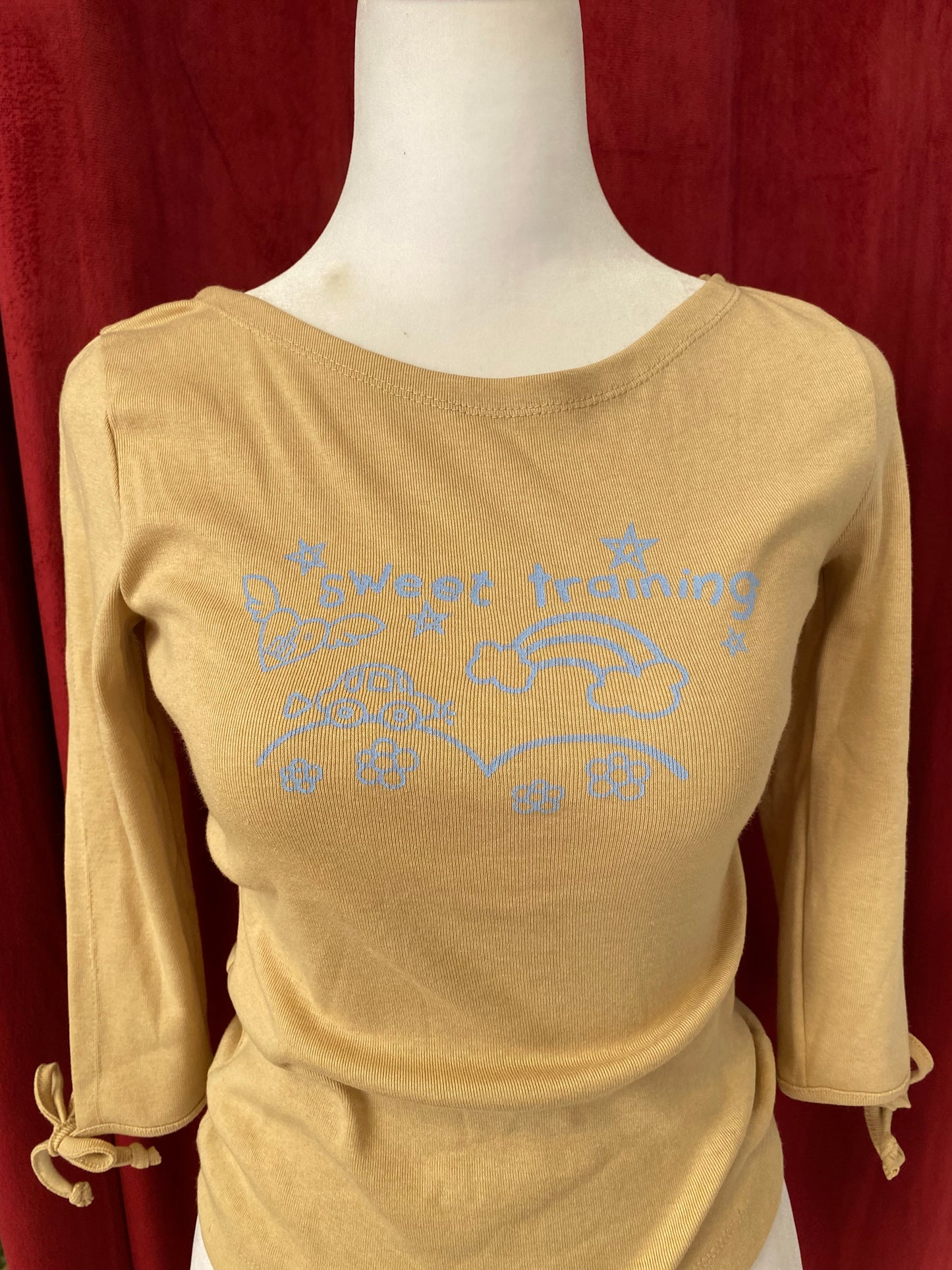 Beige cotton top with graphic design