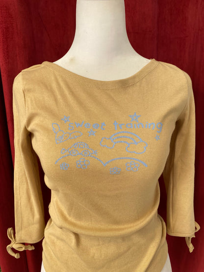Beige cotton top with graphic design