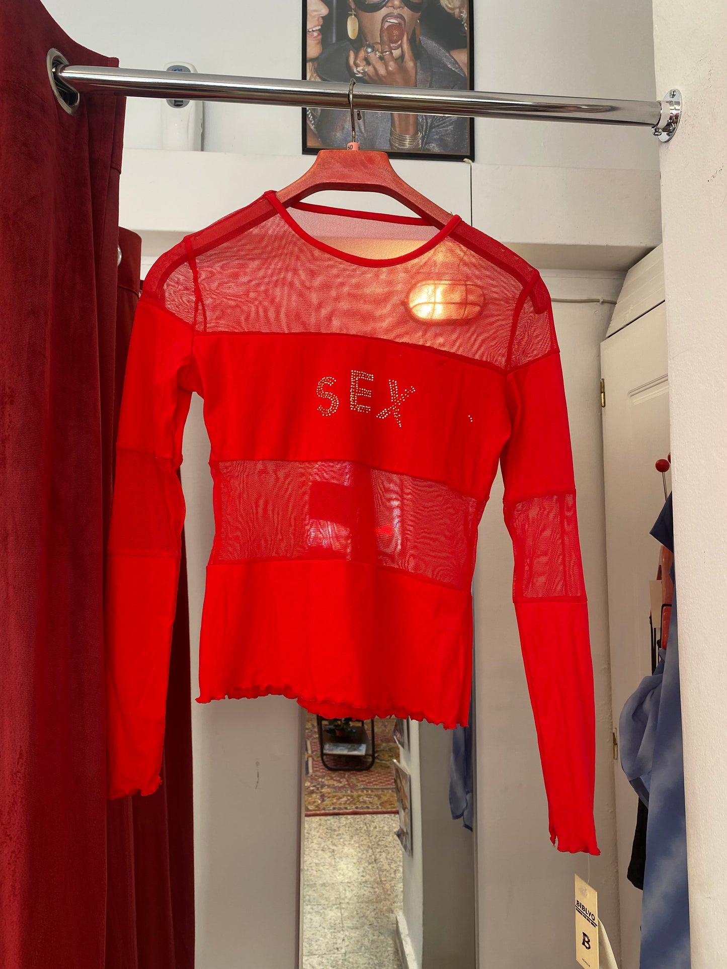Brand new sheer top with sequin”sex” logo