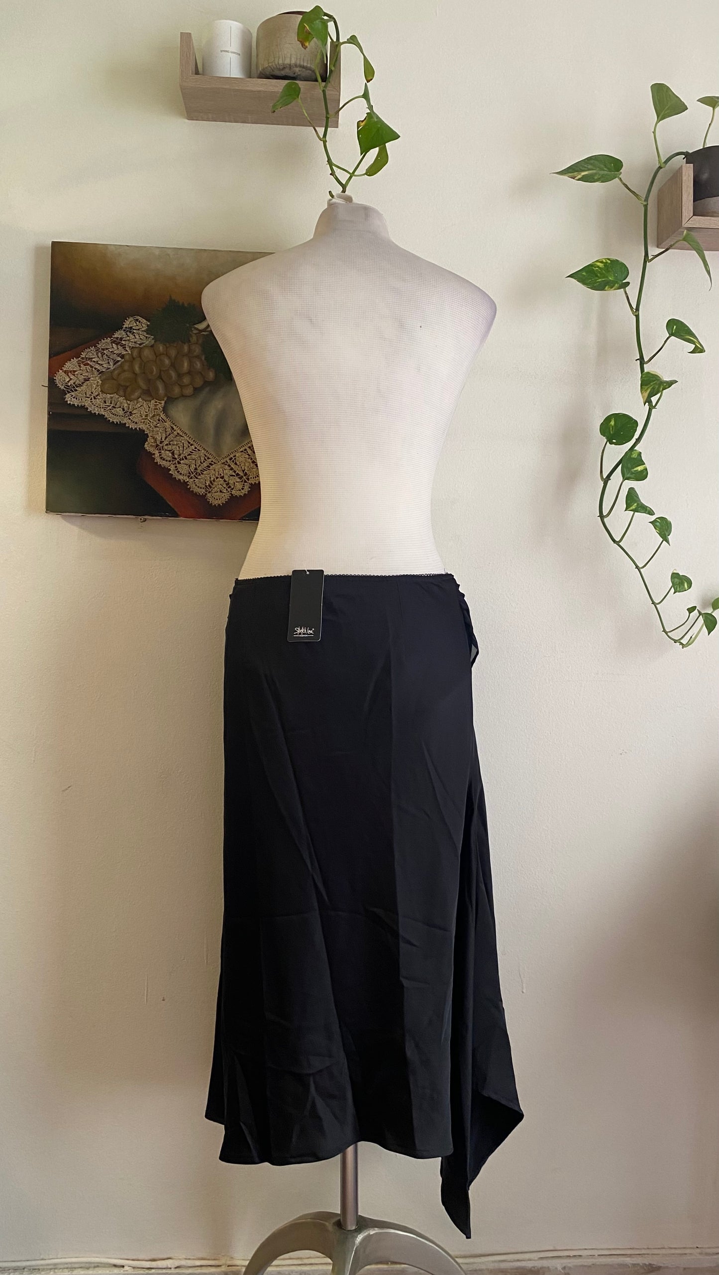 Brand new black satin skirt with buckle detail