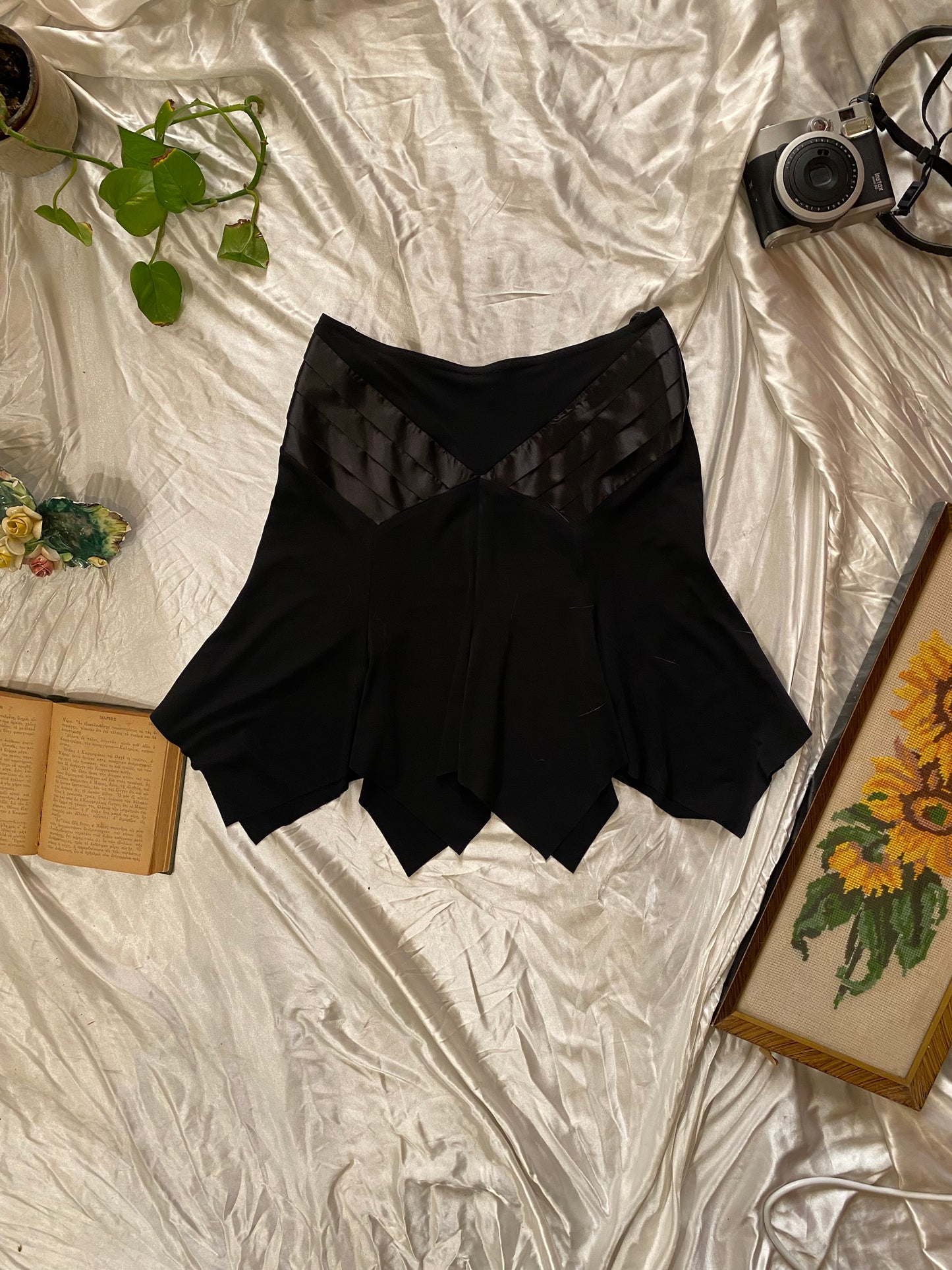 Brand new black asymmetrical mini skirt