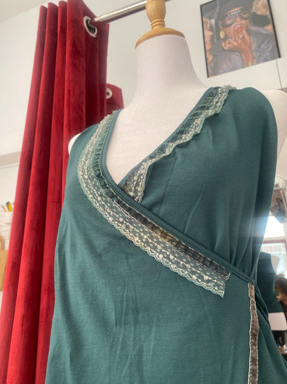 Brand new deep green top with sequin details